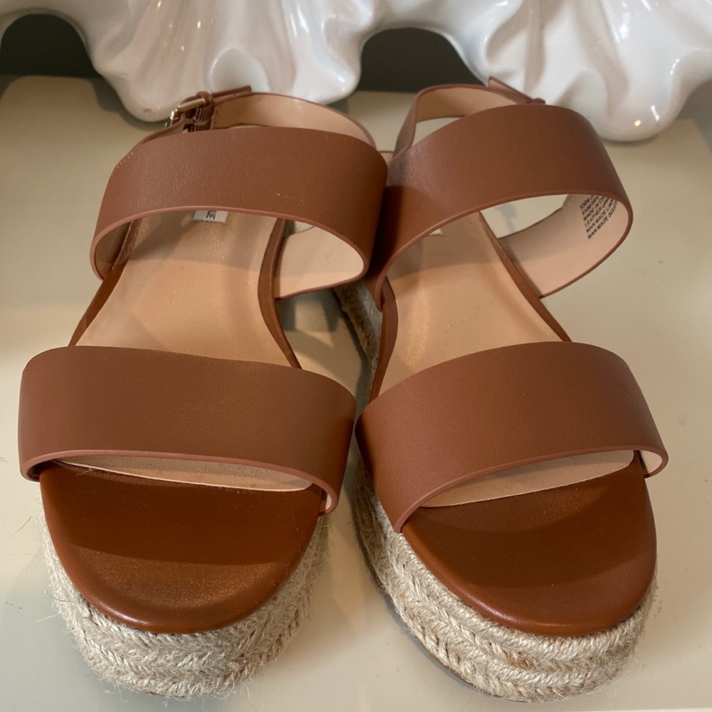 Brown wedge sandals.